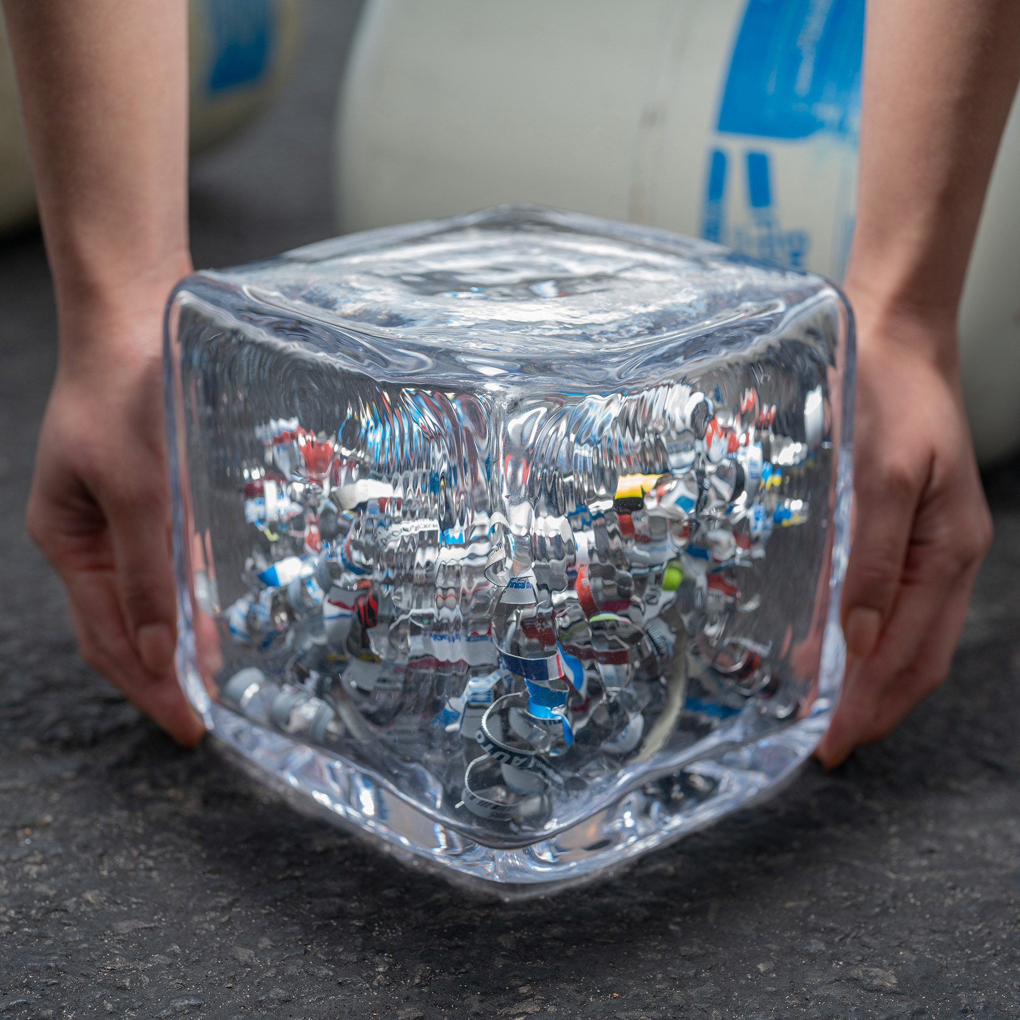 Render of glass block filled with shredded metal.