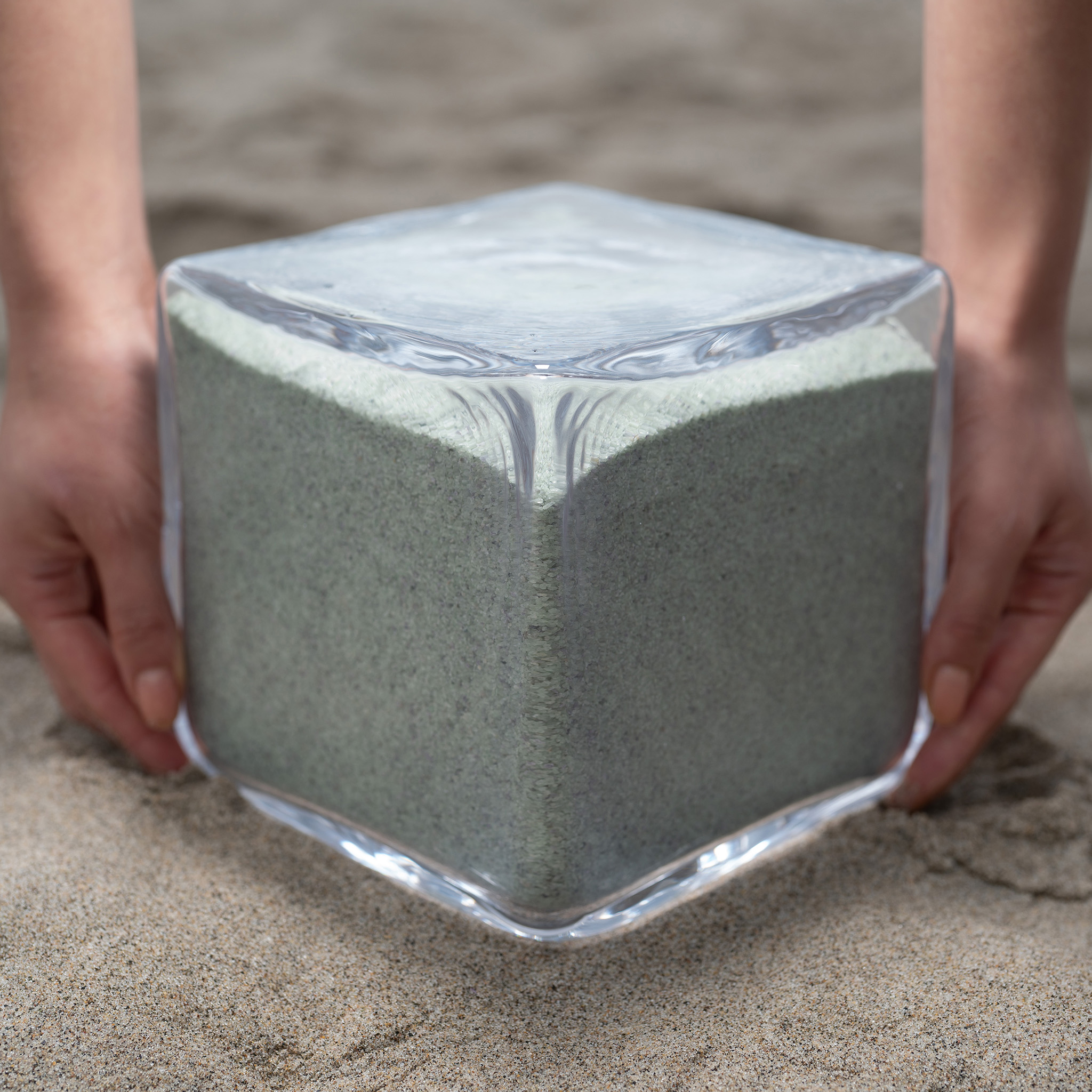 Render of glass block filled with olivine.